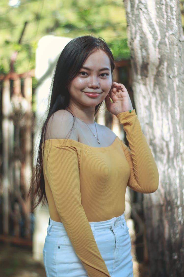 Smiling Girl With Long Straight Hair