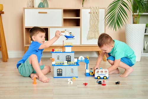 Free Two Boys Playing Toys Stock Photo