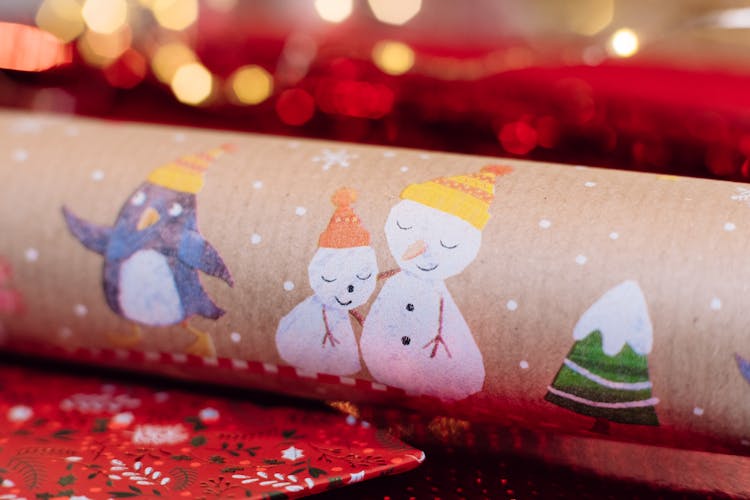 A Roll Of Brown Christmas Wrapping Paper