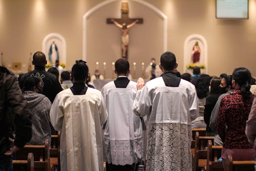 people standing inside the church