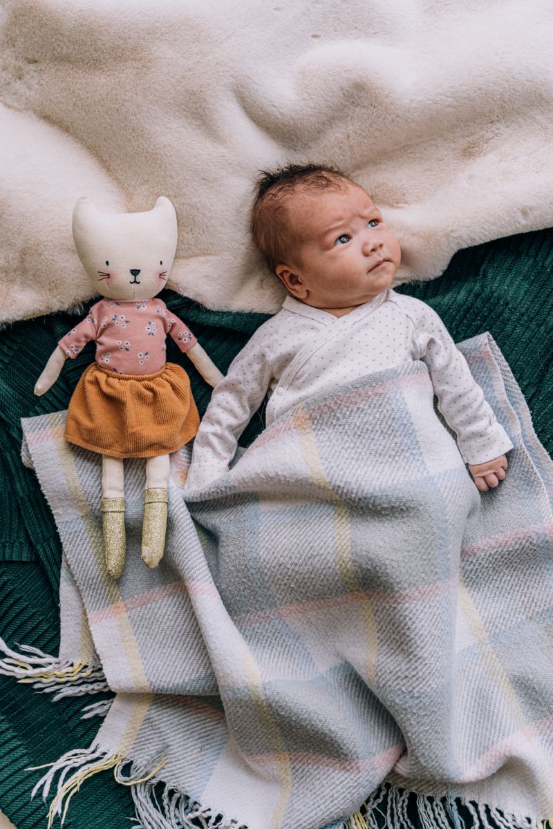Adorable baby wrapped in blanket