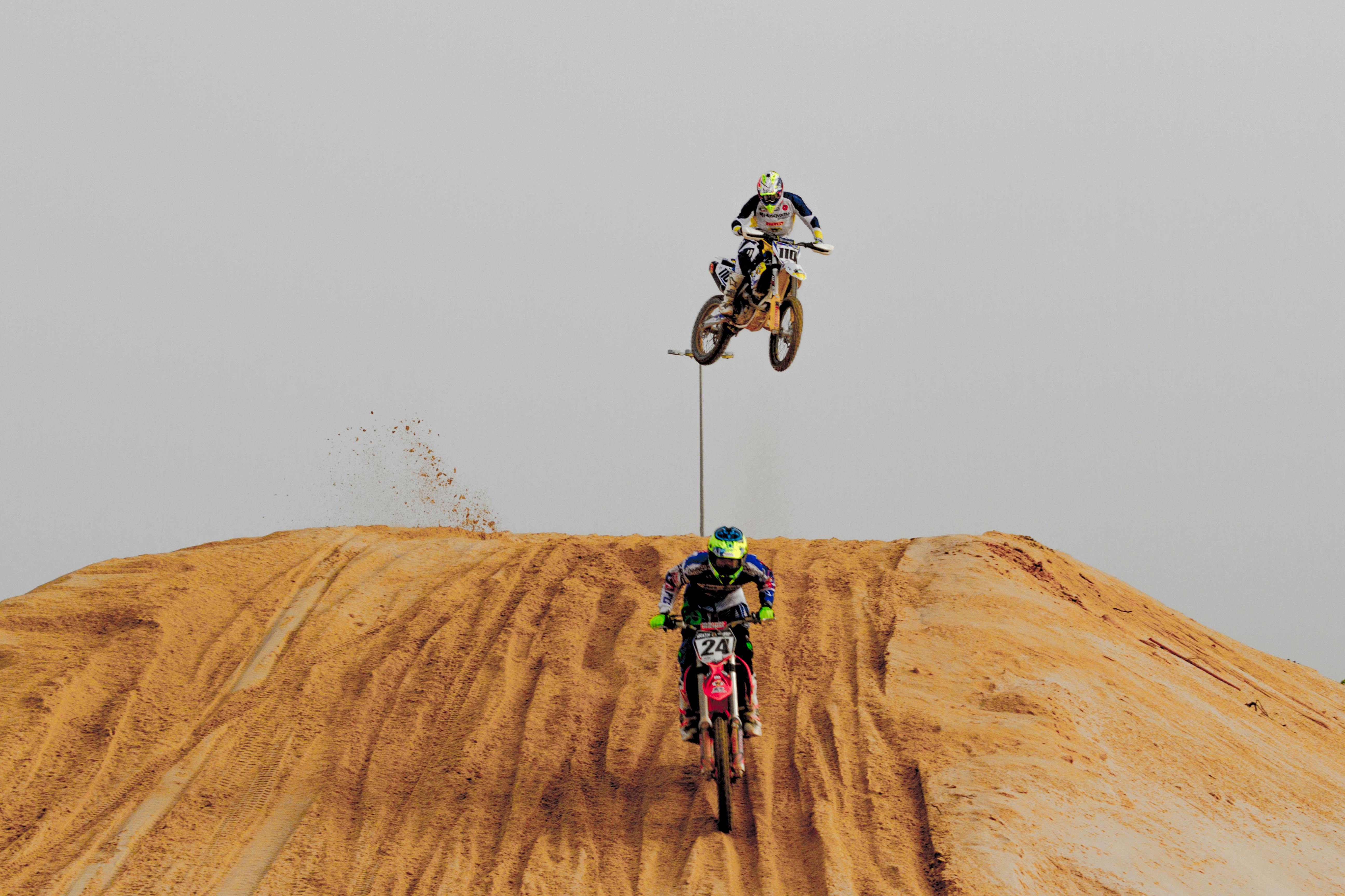 Man Riding Motocross Dirt Bike · Free Stock Photo