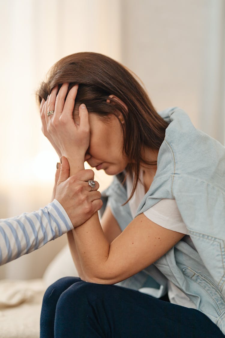 Friend Comforting Unhappy Woman