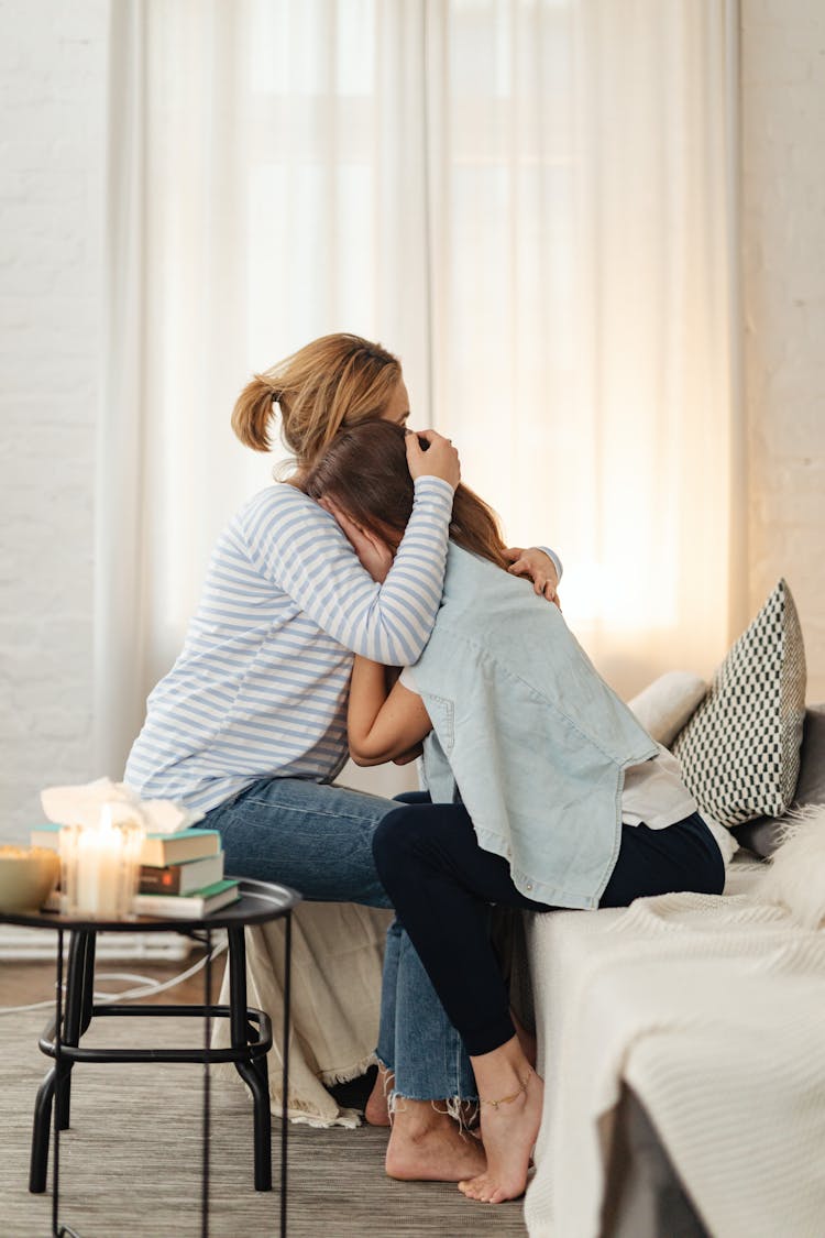 Mother And Daughter Hugging