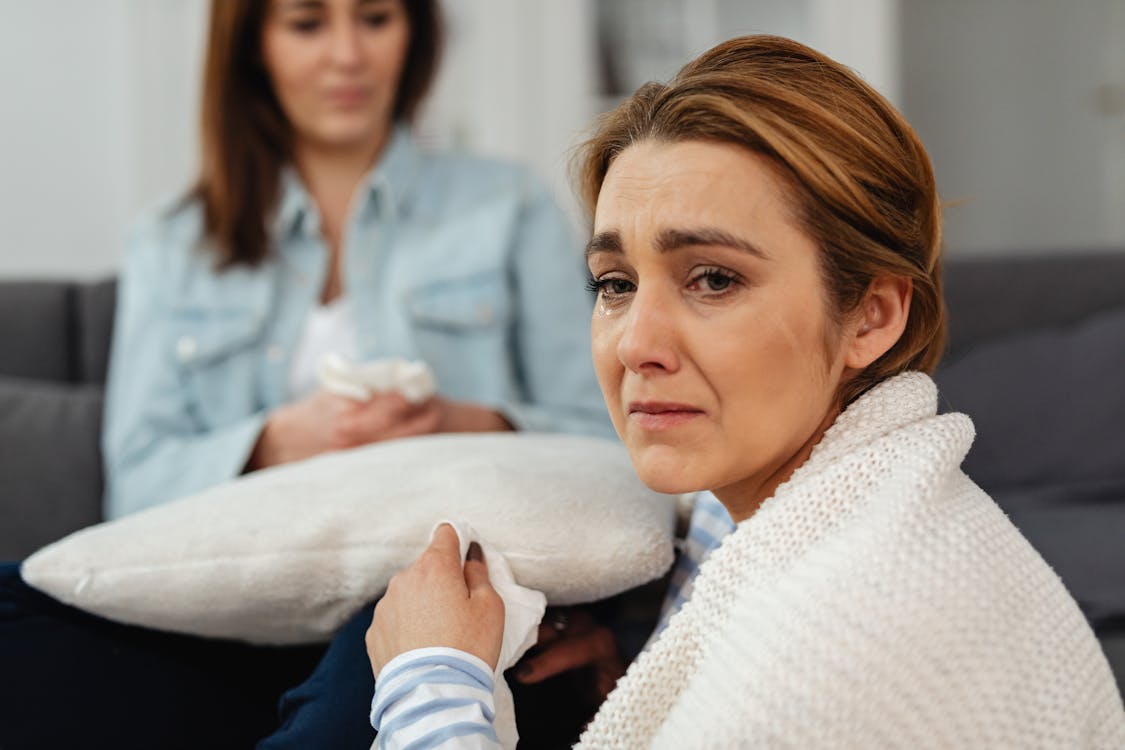 Free Woman in White Sweater Crying With Tears Stock Photo