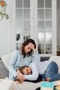 Sad Women Sitting on a Couch