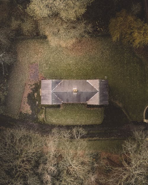 Top View of a House Near Trees