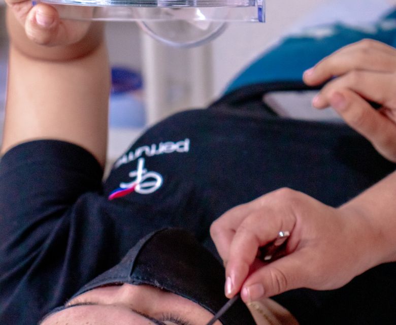 Brow and facial hair treatment being carried out