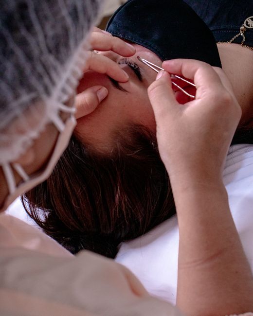 Brow shaping session with precision tools