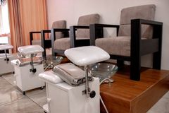 Pedicure stations at Howelwright Skin & Hair. Photo by Gabriel Puyén on Pexels