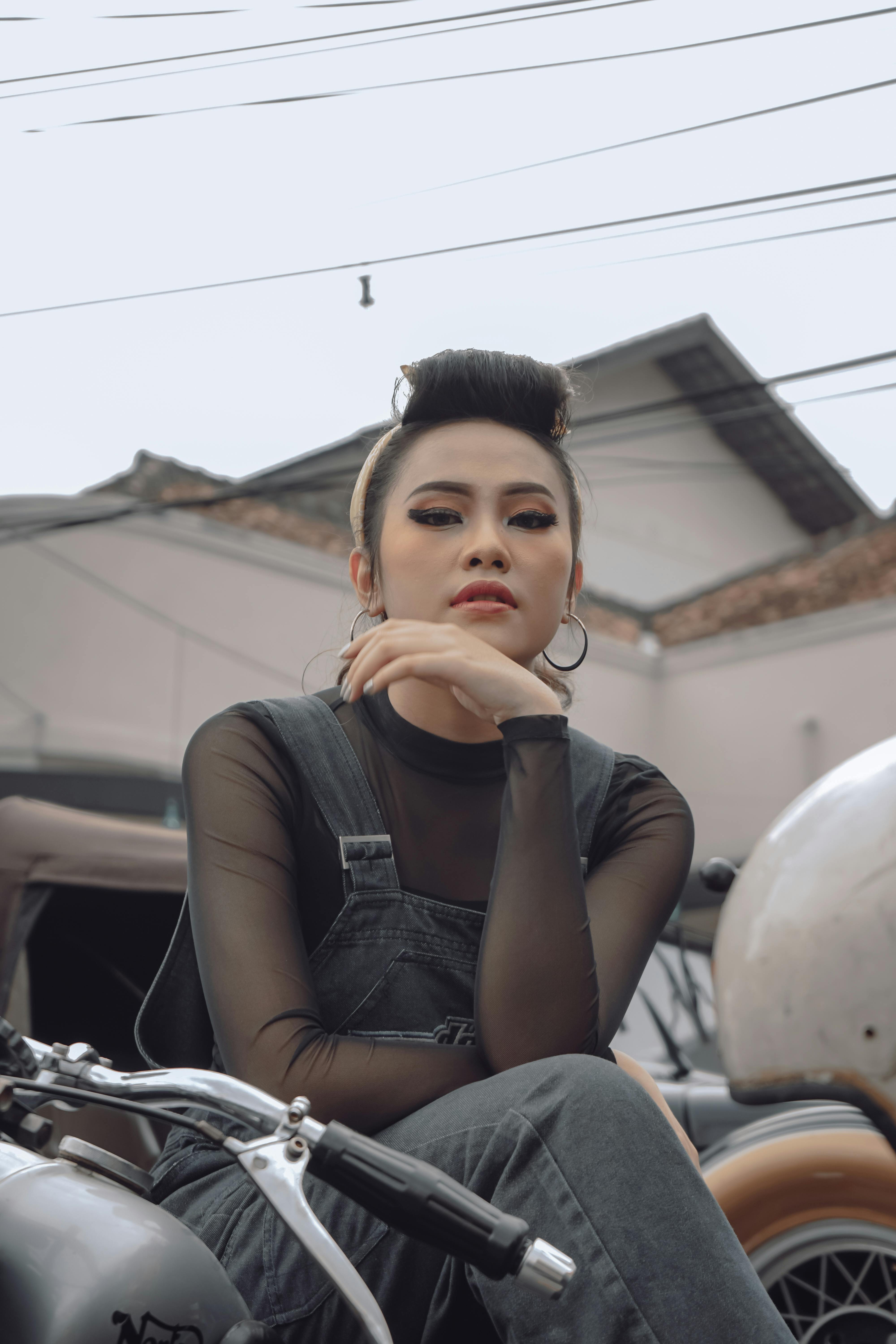 Cool Asian biker on motorbike in city · Free Stock Photo