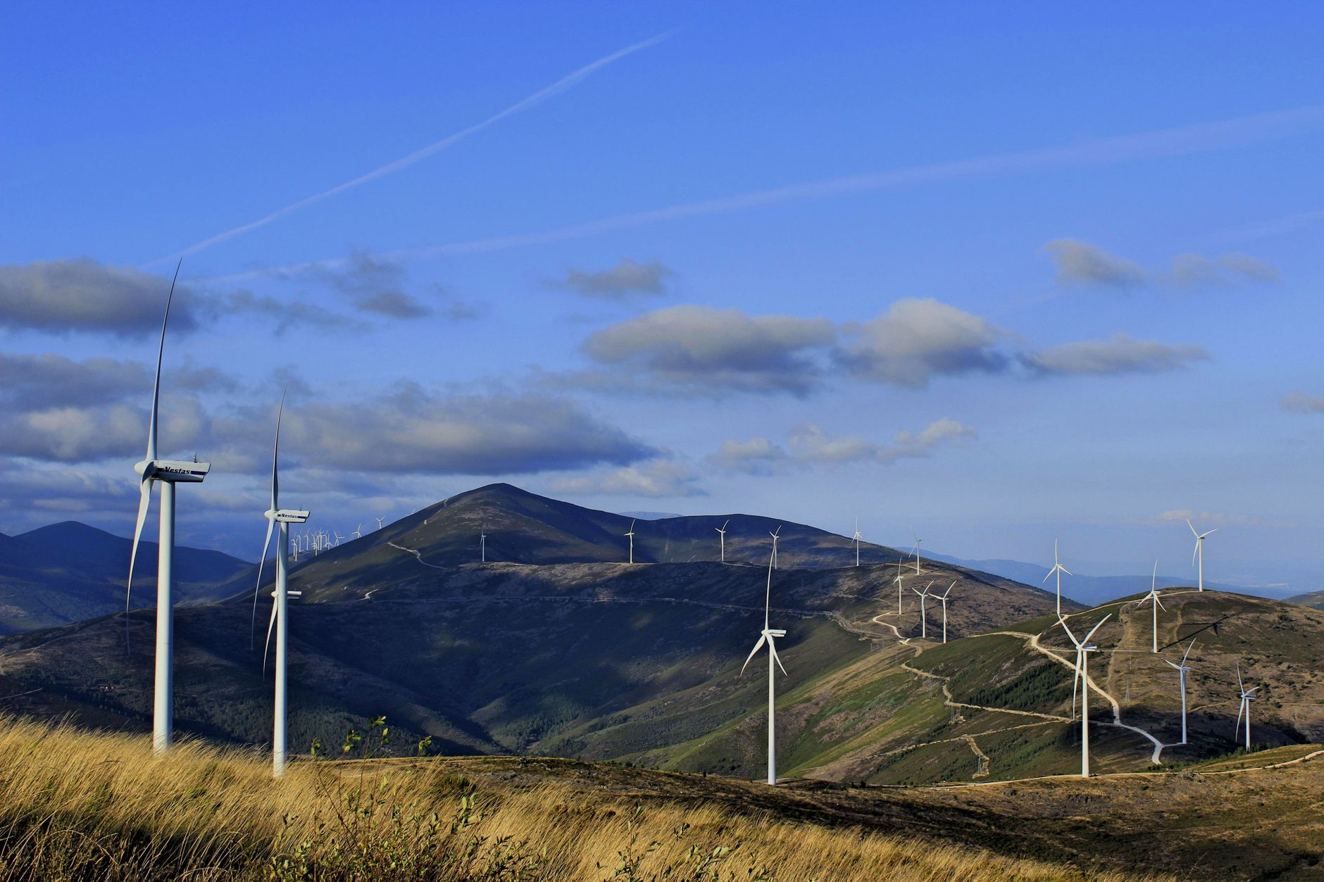 Wind turbines on green hills in Spain