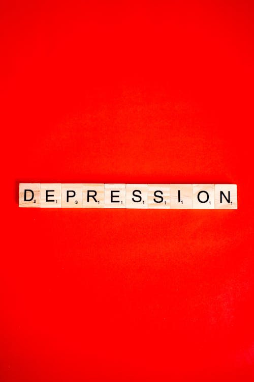Free Photo of Scrabble Tiles Forming the Word Depression Stock Photo
