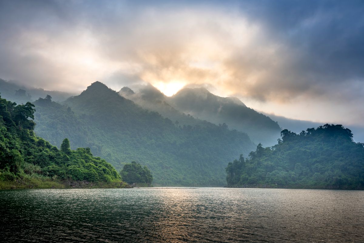 Mist over a mountain lake at sunrise — Quang Nguyen Vinh on Pexels