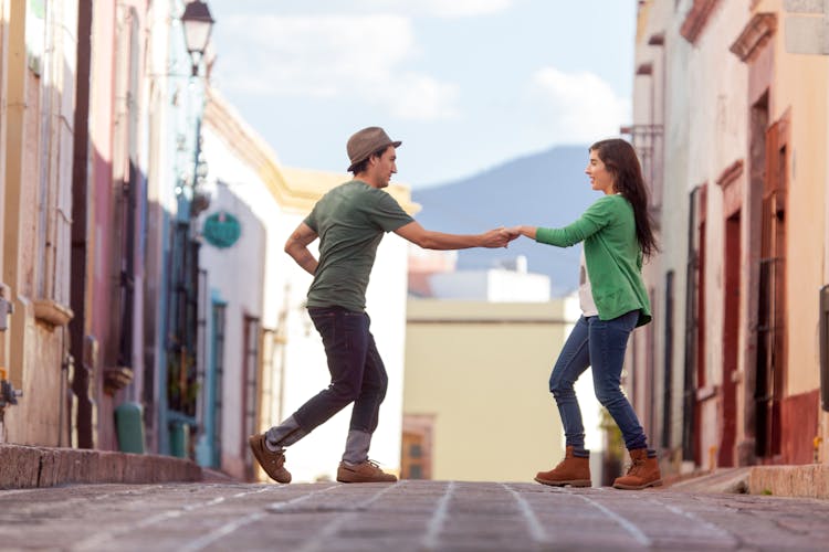 Man And Woman Dancing In The Street