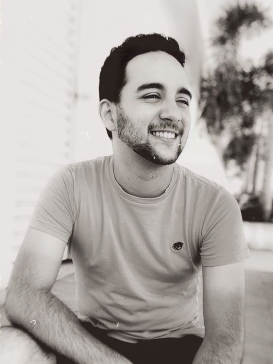 Black and White Portrait of a Man Smiling · Free Stock Photo