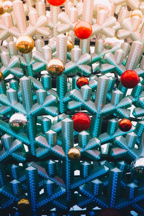Free Creative display of abstract Christmas decorations with colorful ornaments and a bright festive feel. Stock Photo