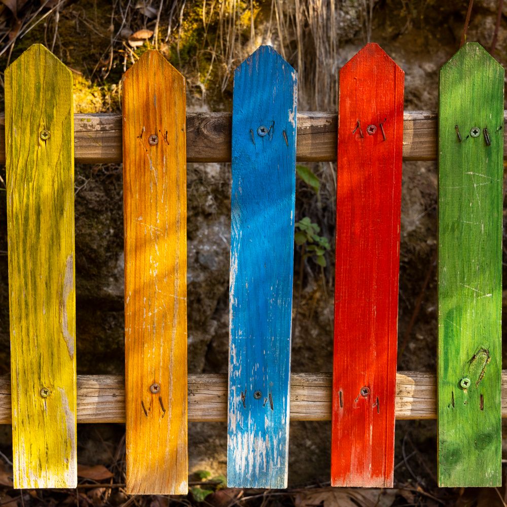 Fence and Decking Painting in Shepherds Bush — clean edges cut in around trim and sockets