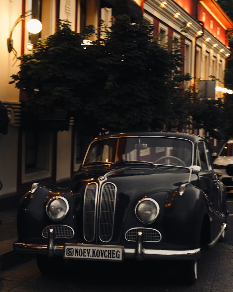 Luxury Retro Black Car Parked In City Street