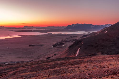 A Lake Surrounded by Stretch of Barren Lands 