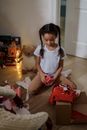 A Girl Unboxing Christmas Presents