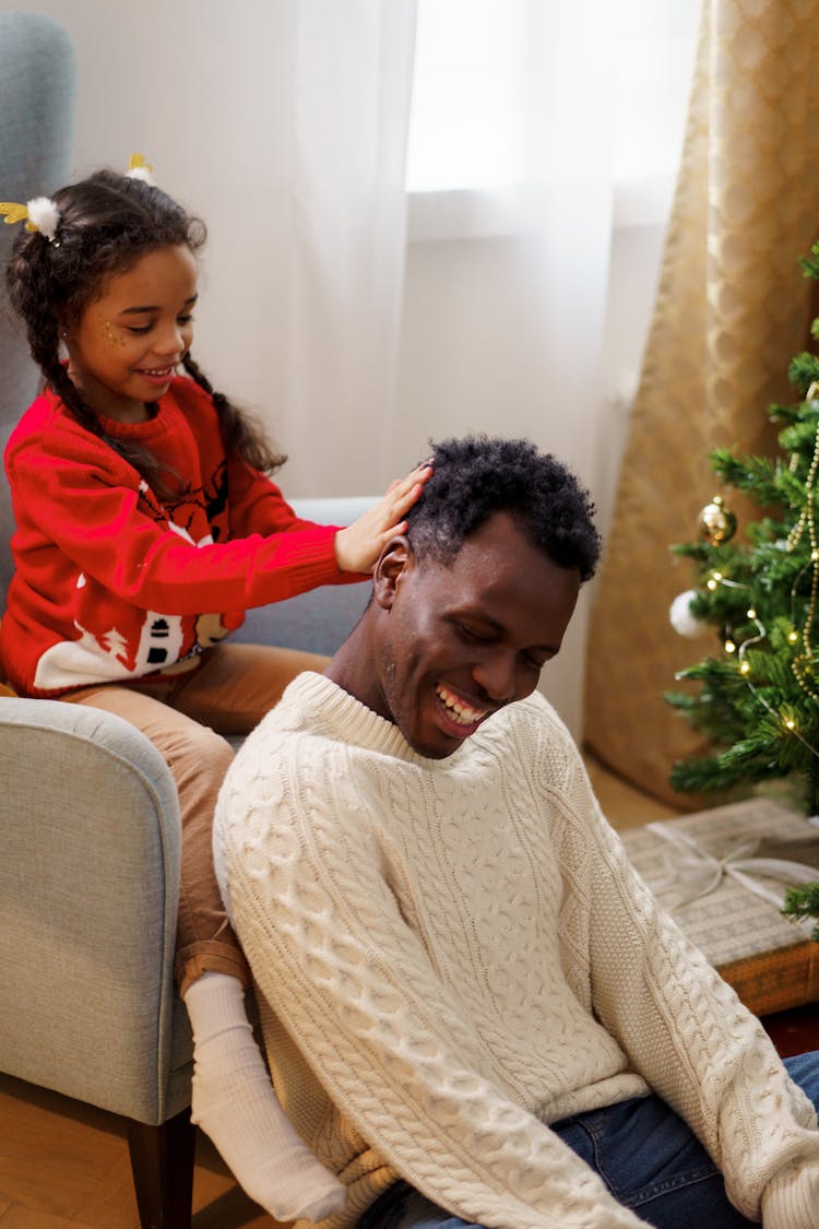 Girl Touching Her Dad's Hair