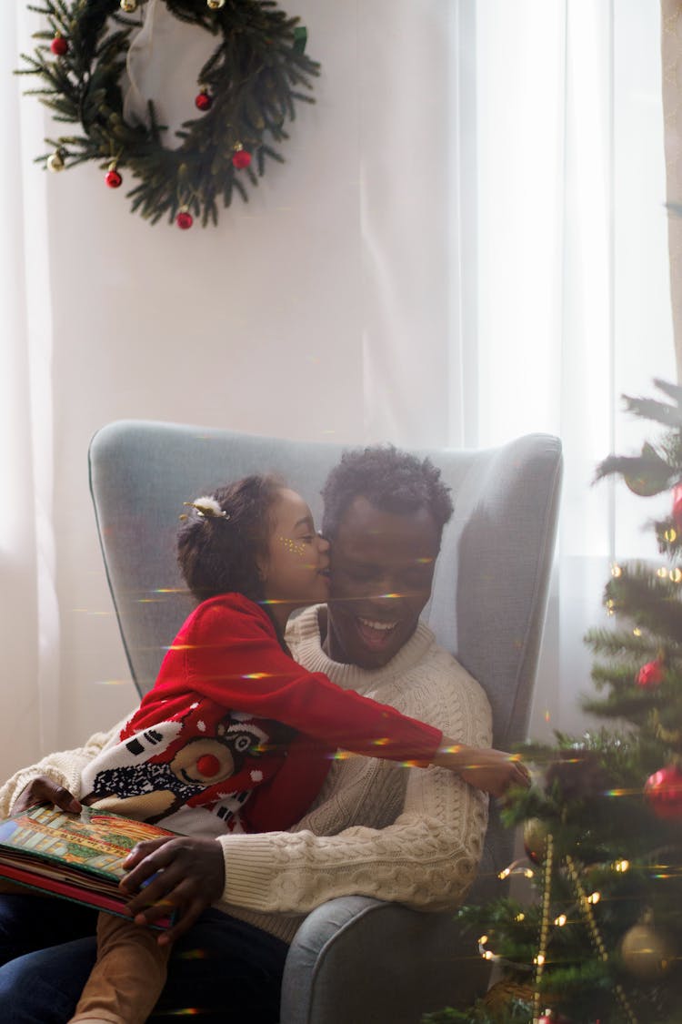 Daughter Adorably Kissing Her Dad