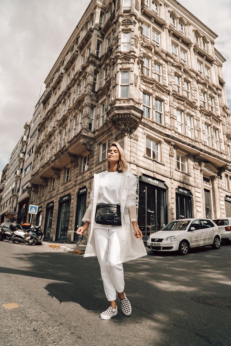 Stylish Woman On Urban Road Against Old Building