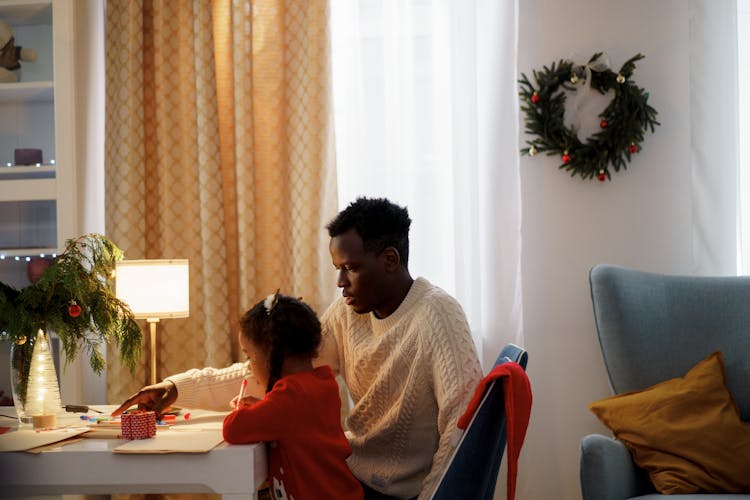 Dad Teaching Her Daughter Make A Christmas Letter