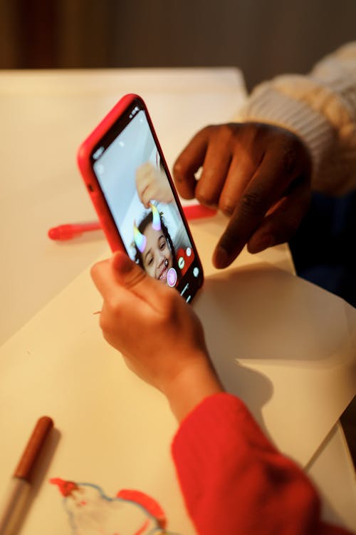 Girl Holding and Taking Selfie Using a Smartphone