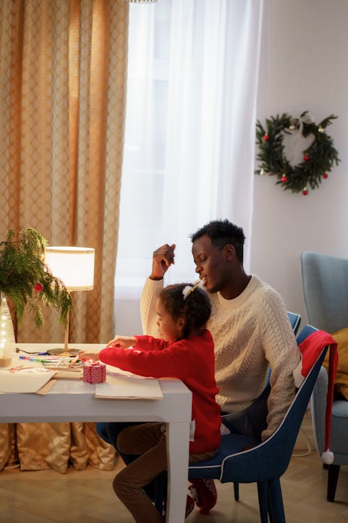 A Dad Watching Her Daughter Make a Christmas Letter