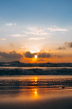 Beautiful sunrise over the coast of Chennai, India with a serene beach view.