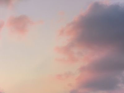 Pastel sky with soft clouds at dusk — photo by Alan Cabello on Pexels