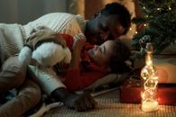 Dad Embracing Her Daughter While Lying Down