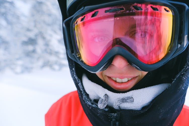 A Person Wearing A Snowboard Helmet