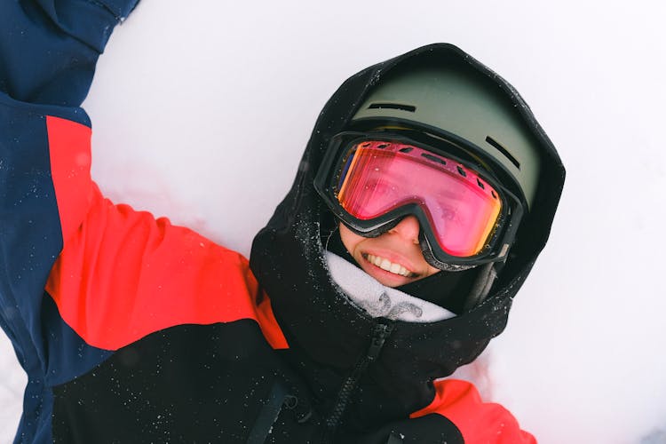 A Person Wearing A Snowboard Helmet