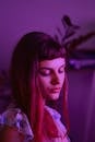 Calm woman in purple neon light