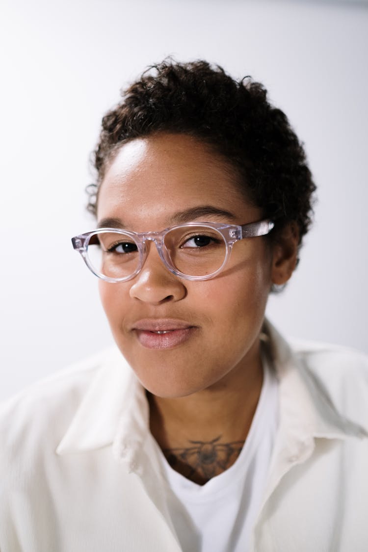 Portrait Of A Young Woman Wearing Clear Eyeglasses Frames 