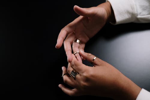 Woman Hands with Elegant Rings