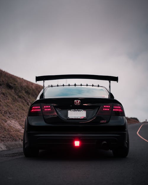 Black Honda Car with Spoiler