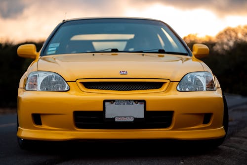 Free Yellow Honda Car During Sunset Stock Photo