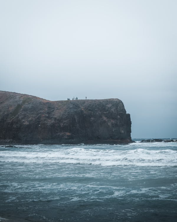 A Rock Formation Near the Body of Water