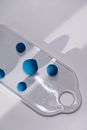 Pink and Blue Egg on Gray Tray