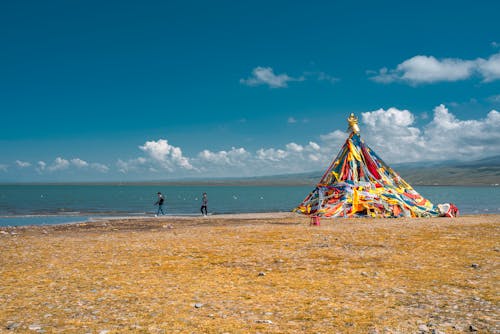 Colorful Religious Structure on a Beach 