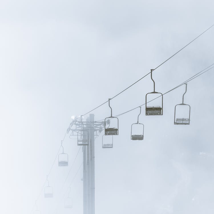 Black Chairlift Under White Sky