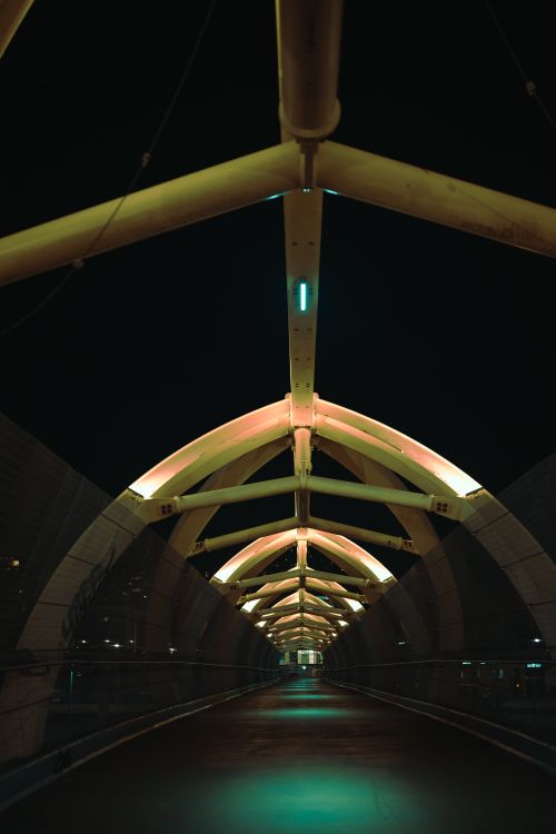 Free Night view of the illuminated Humber Bay Arch Bridge, a modern landmark in Toronto, Canada. Stock Photo