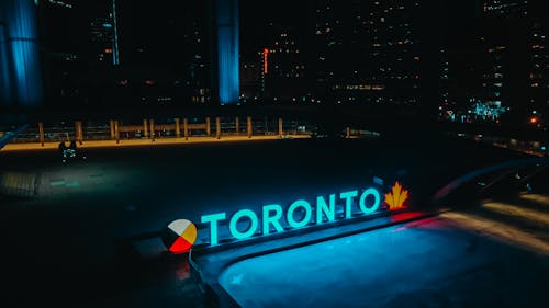  Toronto Neon Sign During Night at the City