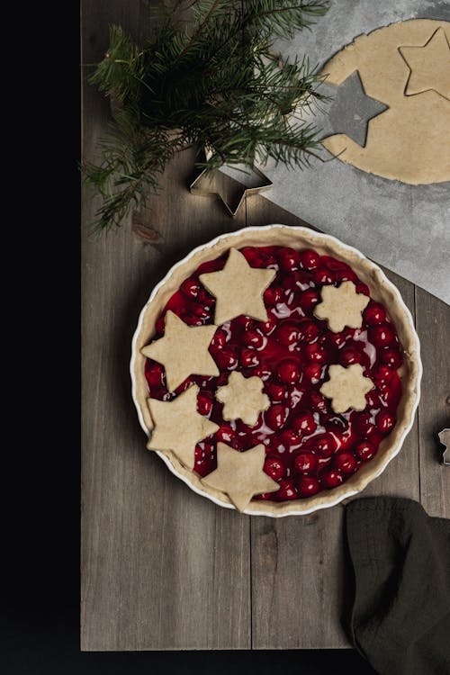 Free Cherry Pie with Star Shaped Dough on Top Stock Photo