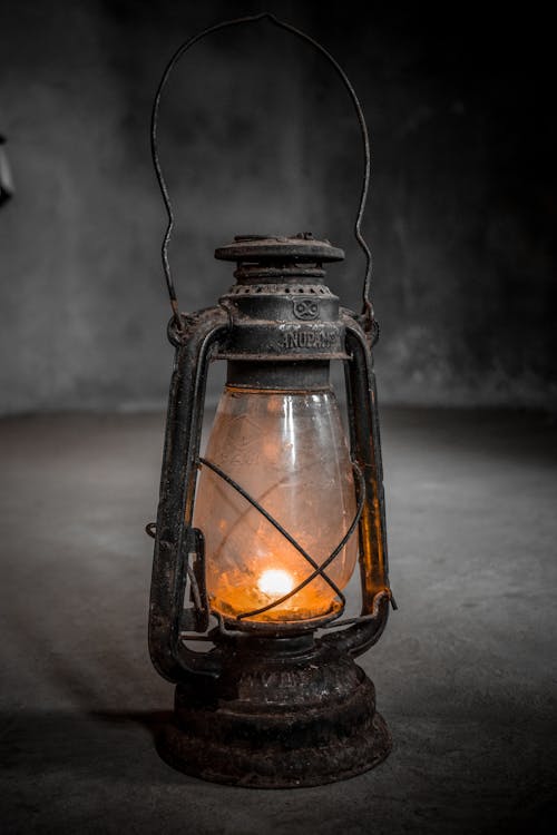 Black and Brown Lantern on Table