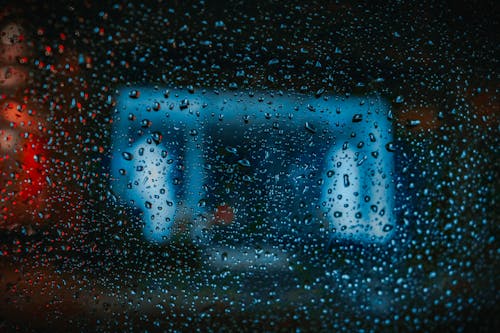 Close-Up Shot of Water Droplets on a Glass Window